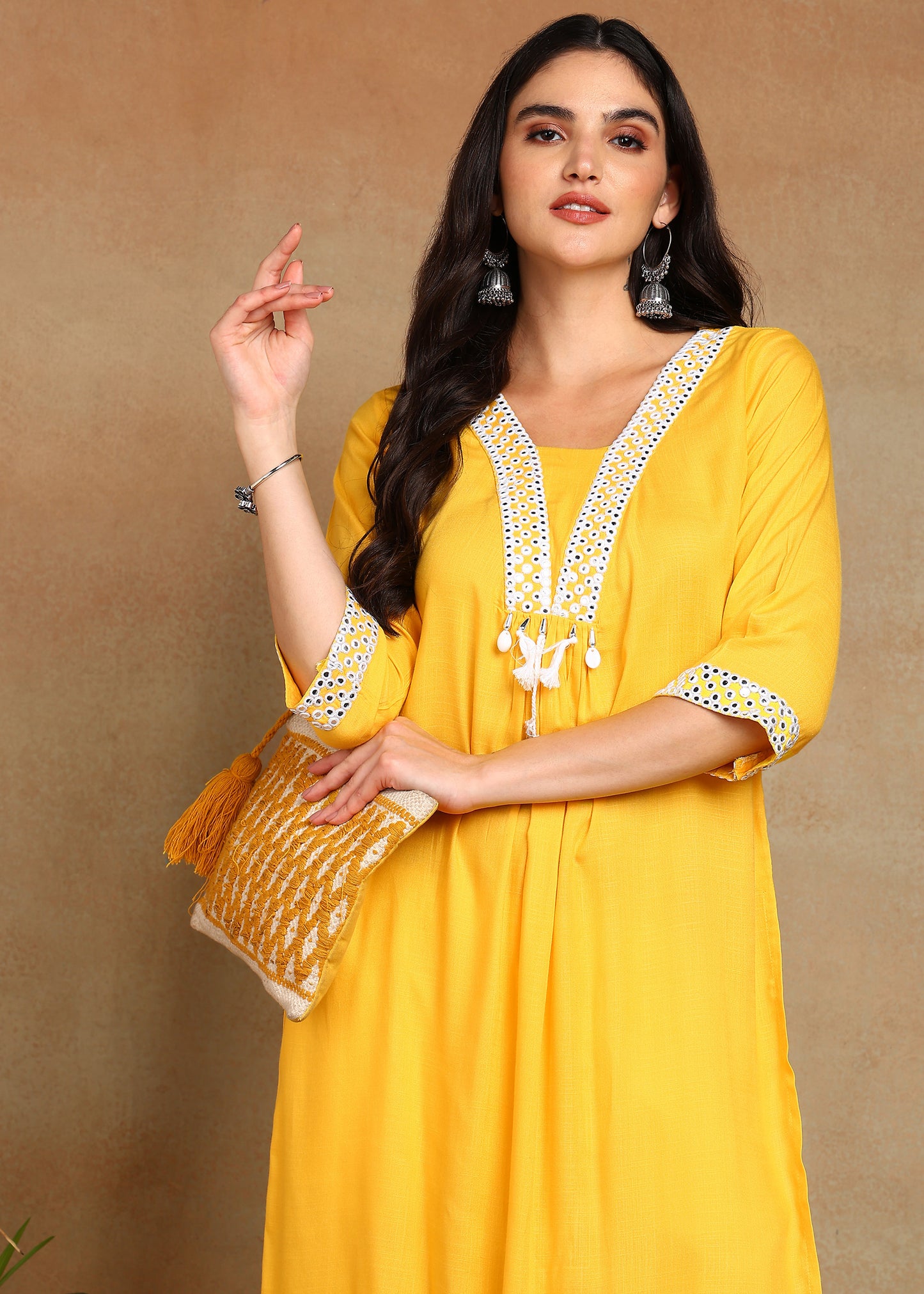Yellow Rayon Slub Kurti with White Embroidered Lace Detailing