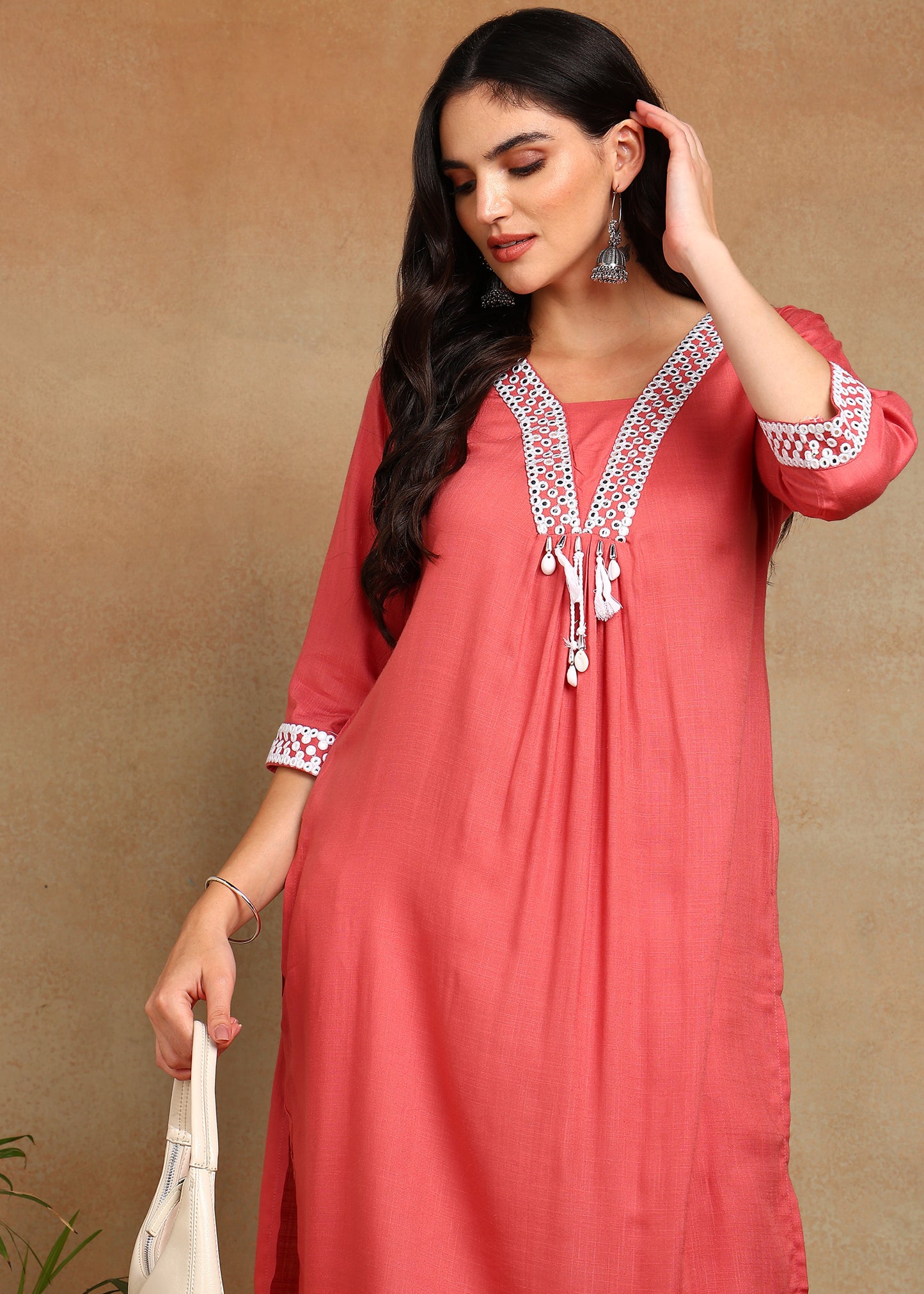 Peach Rayon Slub Kurti with White Embroidered Lace Detailing