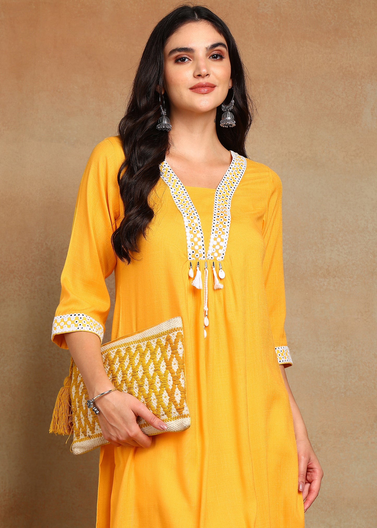 Mustard Rayon Slub Kurti with White Embroidered Lace Detailing