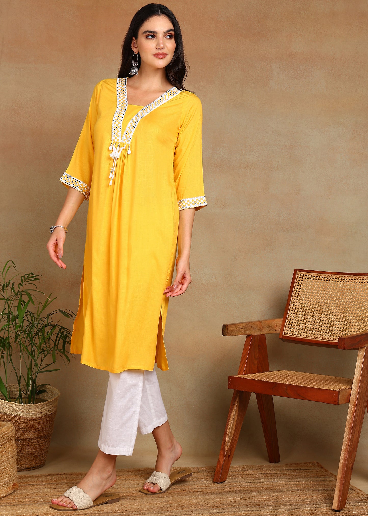 Yellow Rayon Slub Kurti with White Embroidered Lace Detailing