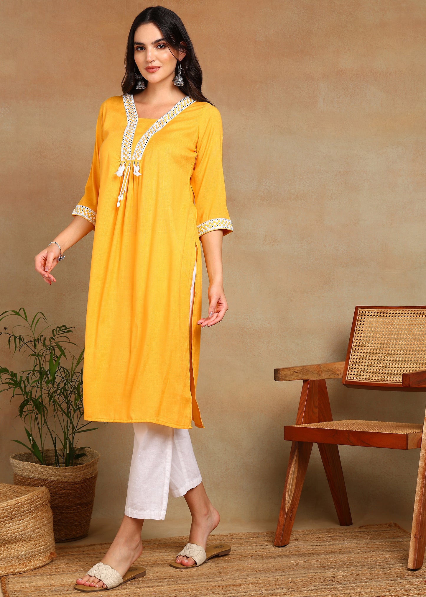 Mustard Rayon Slub Kurti with White Embroidered Lace Detailing