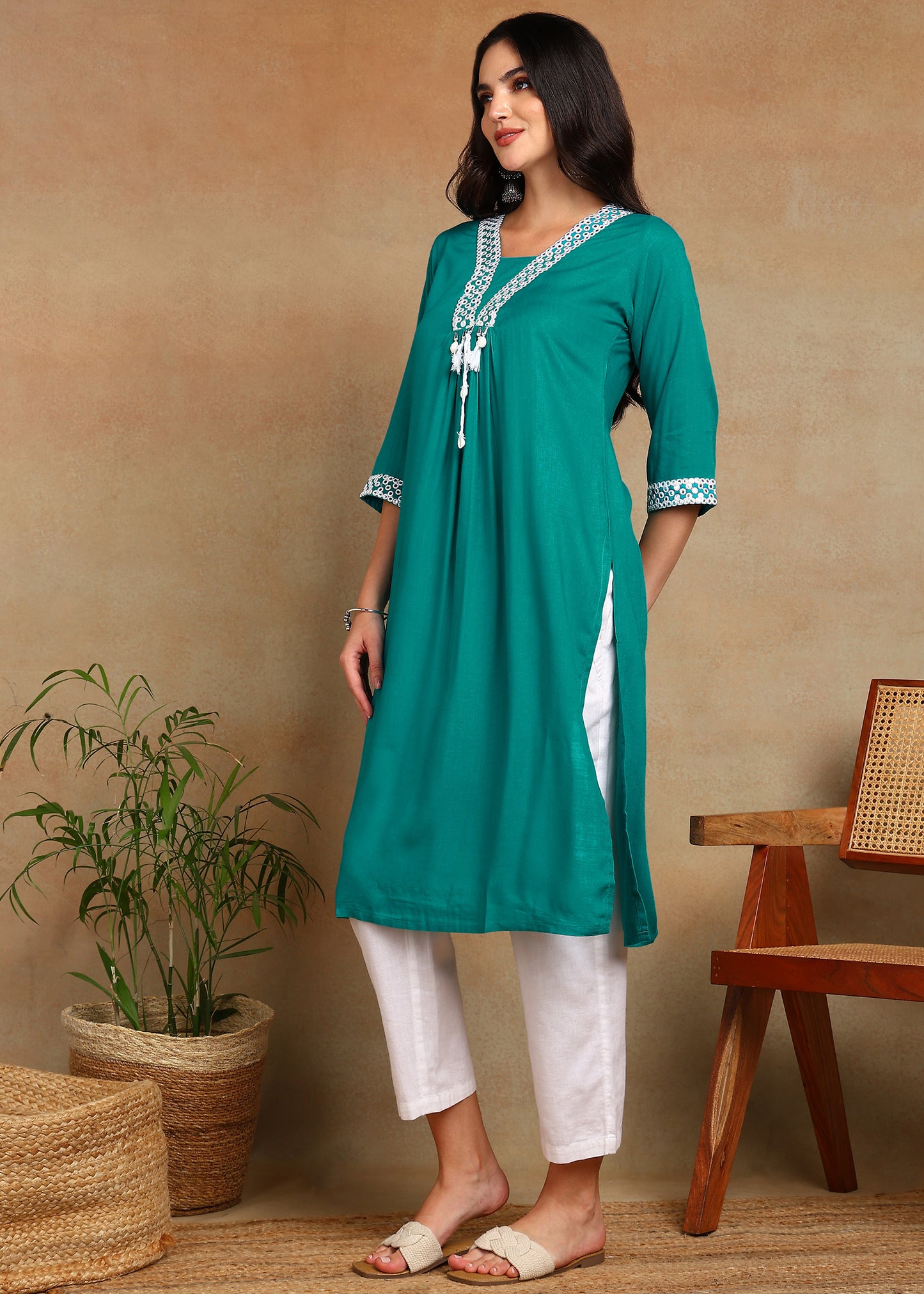 Teal Rayon Slub Kurti with White Embroidered Lace Detailing