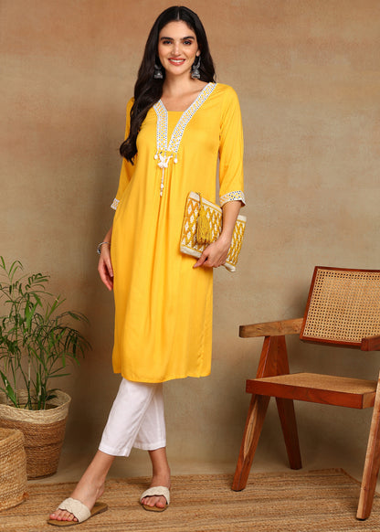 Yellow Rayon Slub Kurti with White Embroidered Lace Detailing