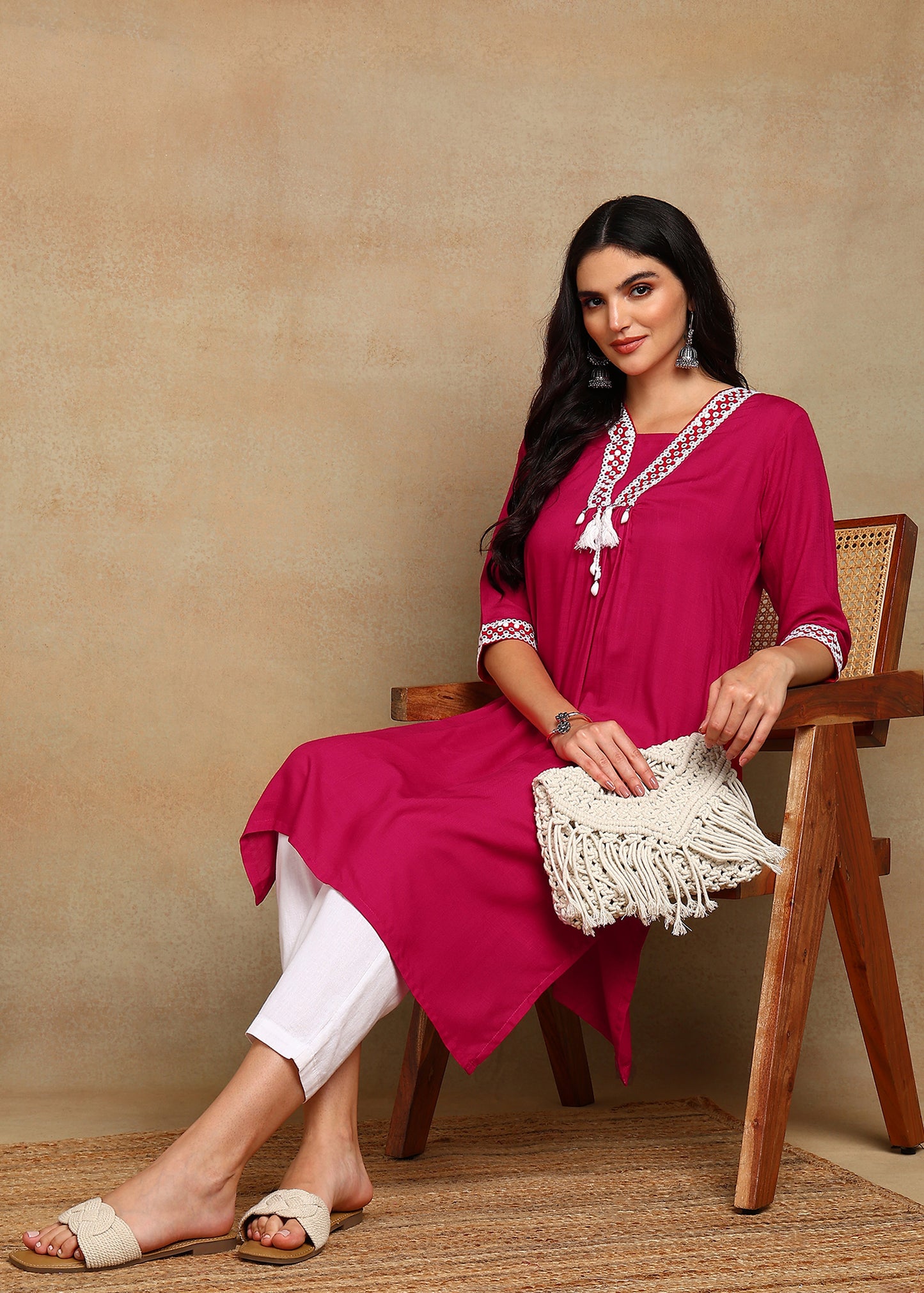Pink Rayon Slub Kurti with White Embroidered Lace Detailing