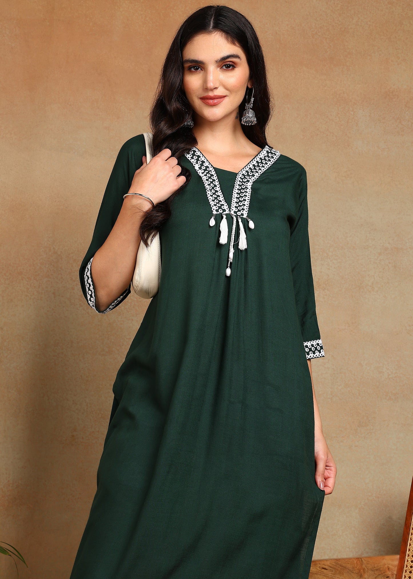Bottle Green Rayon Slub Kurti with White Embroidered Lace Detailing